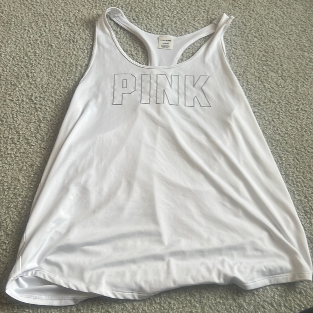 Pink active muscle tank top barley wore